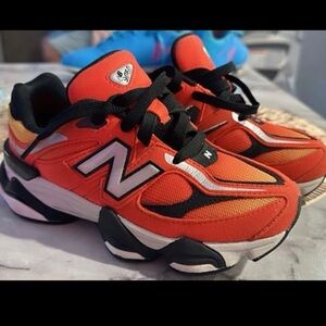 New Balance Kids' Vibrant Red and Black Sneakers
